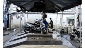 There are a lot of motorcycles in Bangkok, many of them used as taxis. They also have their dedicated washing stations